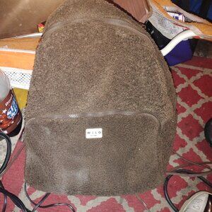 Hello the label fuzzy brown backpack